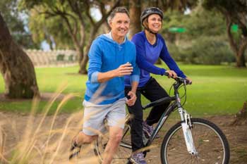 woman-and-man-exercising-on-fitness-trail