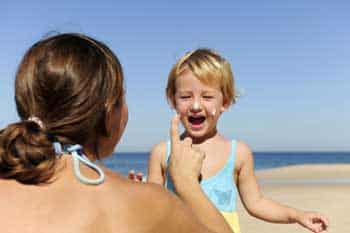 mother-daughter-playing-at-the-beach