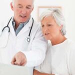 doctor-consulting-with-geriatric-patient