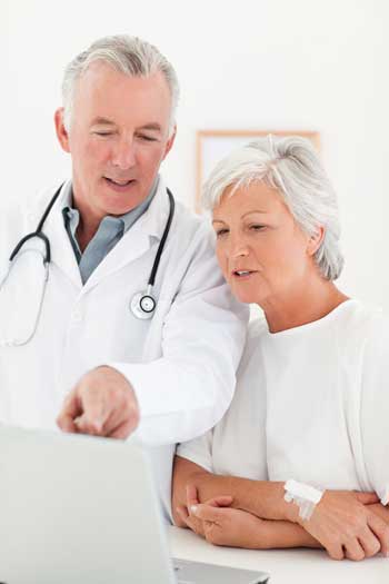 doctor-consulting-with-geriatric-patient